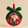 Sfera di Natale Rossa con Schiaccianoci in Rilievo e Fiocco in Velluto Verde – Ø 10 cm