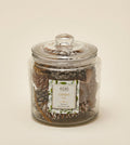 Pot-pourri in vasetto con pigne Pot-pourri