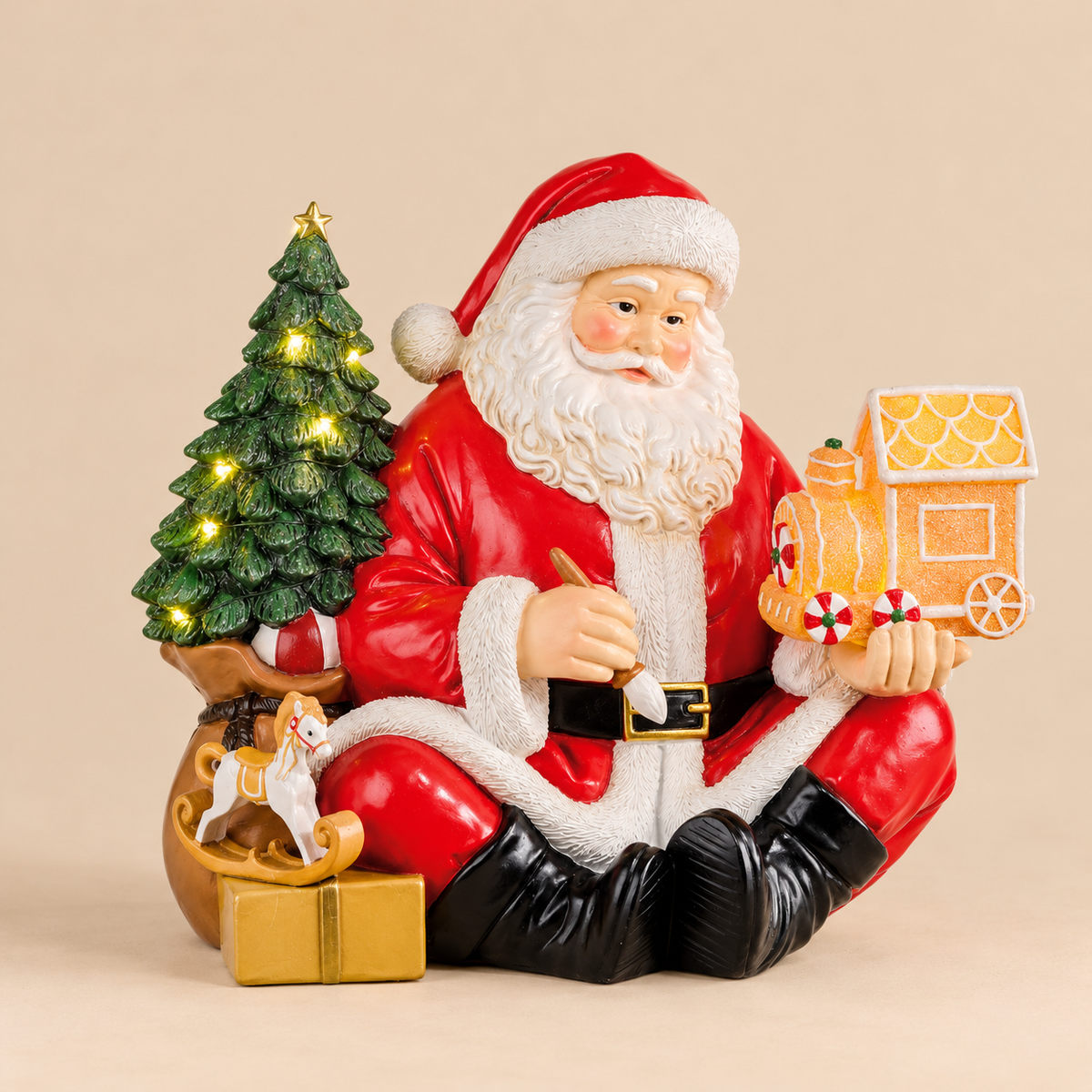 Babbo Natale Seduto con Albero Illuminato e Trenino Natalizio in Resina – Collezione My Dear Santa 24x14x21 cm