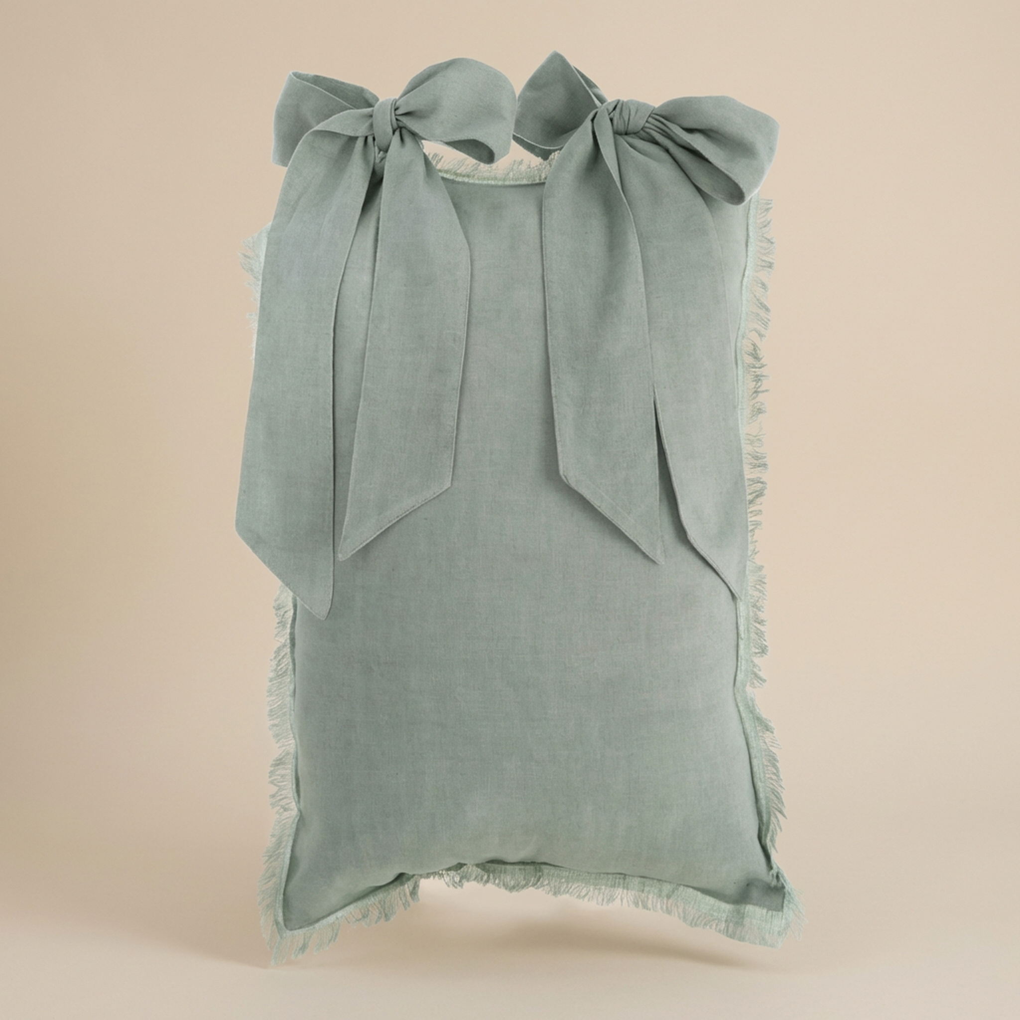 Cuscino rettangolare con fiocchi