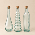 Set 3 Bottigliette Decorative in Vetro Riciclato Trasparente con Tappo in Sughero – Forme Assortite – H 19 cm