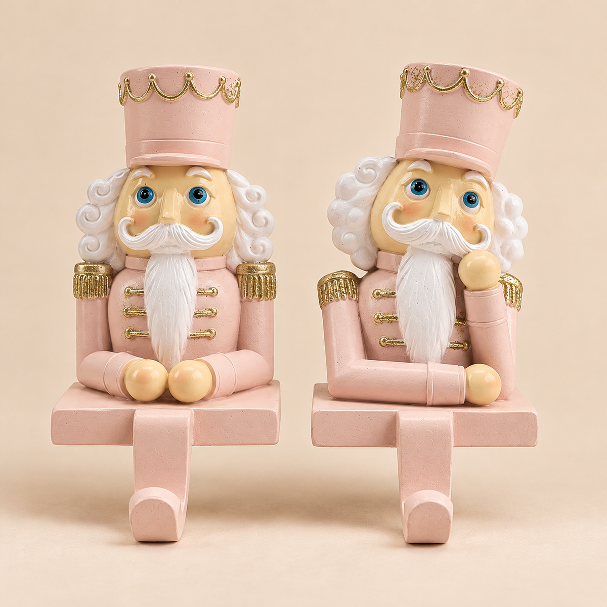Set 2 Ganci per Calze Natalizie Schiaccianoci Rosa e Bianco con Dettagli Oro H12 cm